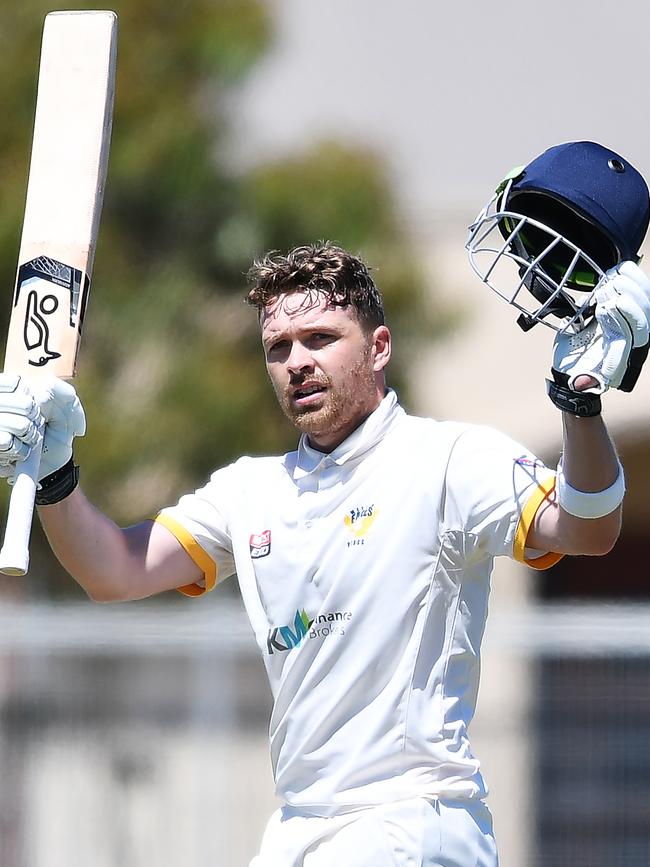 West Torrens batsman Ryan Gibson celebrating bringing up his century during a Premier Cricket match against Woodville last weekend. Picture: Mark Brake