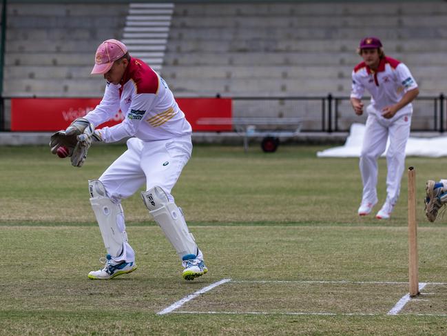 Alstonville wicketkeeper Kyle Yager takes a return from the outfield in Far North Coast LJ Hooker League cricket against Marist Brothers at Oakes Oval, Lismore.