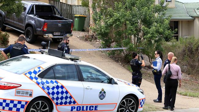 Police on the scene at Kumnick Street, Upper Coomera where there was a shooting last night involving a Rebels bikie Gokhan Turkyilmaz. Pics Adam Head