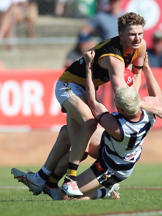 Yarrawonga’s Logan Morey attempts to drag down Albury’s Riley Bice.