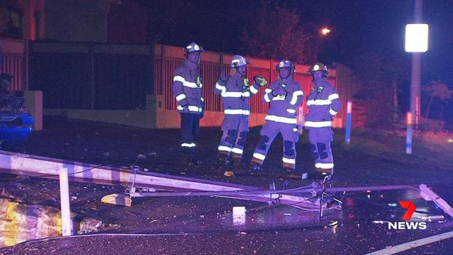 A 20-year-old driver has been taken to hospital after his ute flipped on its roof after crashing into a Stobie pole at Torrens Park. . Picture: 7NEWS