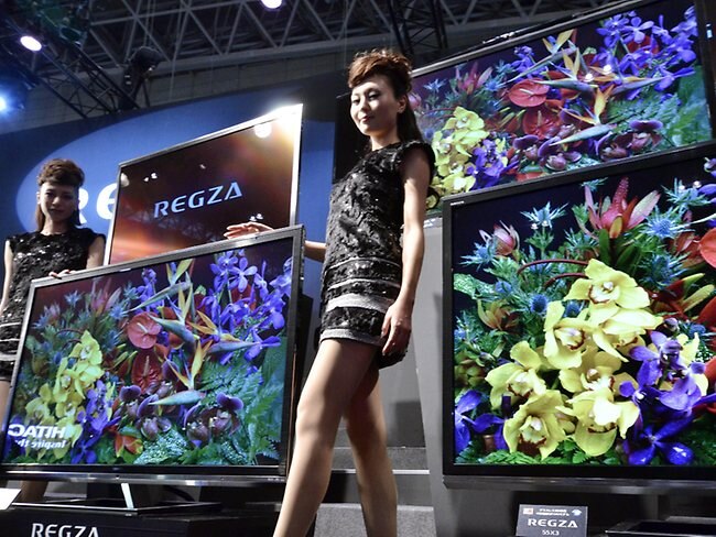 <p>Models pose with Japanese electronics company Toshiba's 55-inch glasses-free 3D television called the "Regza 55X3', which has "Quad Full High Definition" (QFHD) with a 3840 x 2160-pixel LCD display and which shows 2D and 3D high definition images. Toshiba will put the Regza 55X3 on the market in December.</p> <p>Picture: AFP</p>