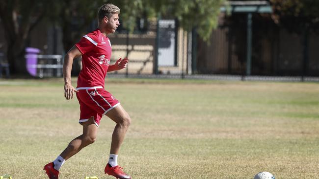 Adelaide United Stefan Mauk training alone at Underdale High School. Picture: Sarah Reed