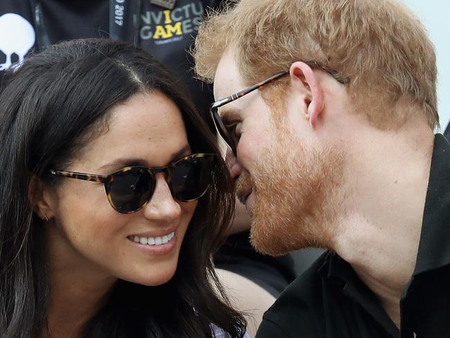 TORONTO, ON - SEPTEMBER 25:  Prince Harry (R) and Meghan Markle (L) attend a Wheelchair Tennis match during the Invictus Games 2017 at Nathan Philips Square on September 25, 2017 in Toronto, Canada  (Photo by Chris Jackson/Getty Images for the Invictus Games Foundation )