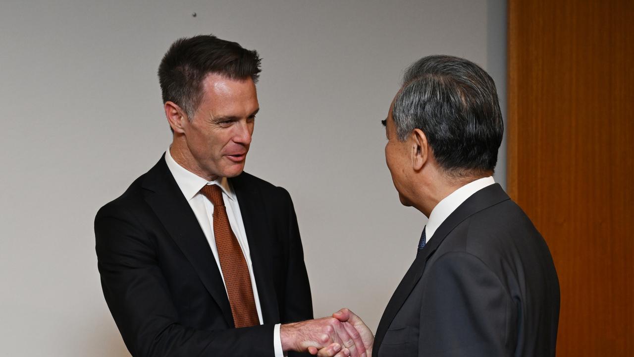 NSW Premier Chris Minns met with Chinese Foreign Minister Wang Yi, right. Picture: Dean Lewins/POOL/ NCA NewsWire.