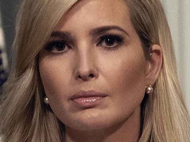 Ivanka Trump listens to her father US President Donald Trump address the Interagency Task Force to Monitor and Combat Trafficking in Persons annual meeting at the White House in Washington, DC, on October 11, 2018. (Photo by NICHOLAS KAMM / AFP)