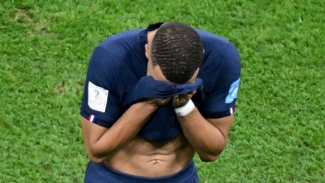 A shattered Kylian Mbappe after the shootout.