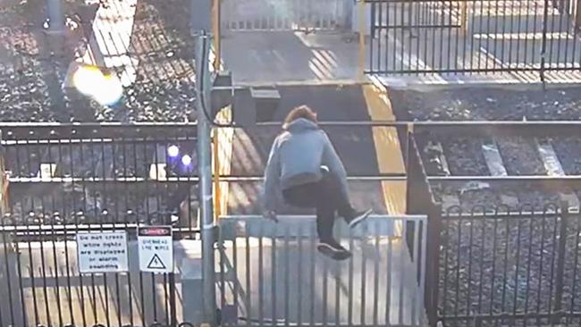 The state government has launched a new campaign highlighting the poor safety practices of pedestrians at rail crossings. Picture: Supplied