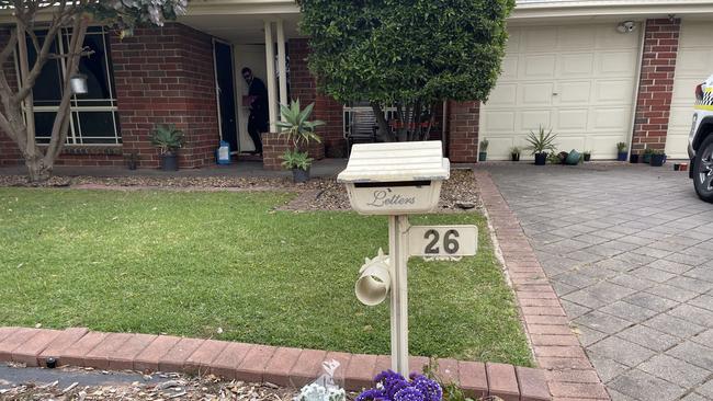 A group of women came to the house to drop flowers in memory of Krystal.