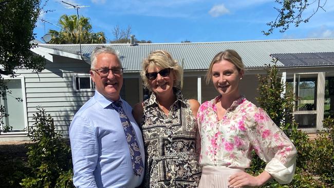 Jamie Kah with her parents, John and Karen Kah. Picture: Supplied