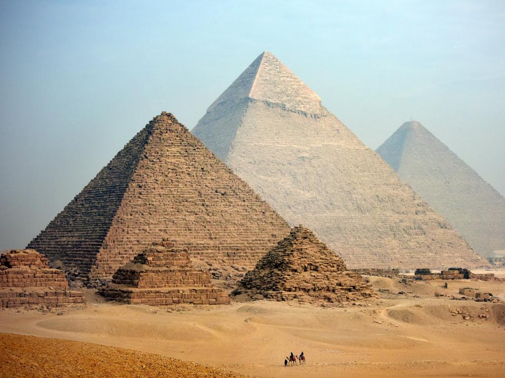 The pyramids, in Cairo, are one of the seven wonders of the world.