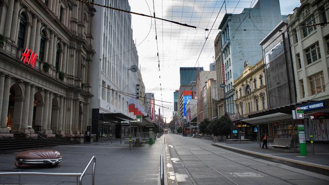 Melbourne’s Bourke St Mall empty as Victoria spends its first day in Stage Four lockdown. Picture: Tony Gough