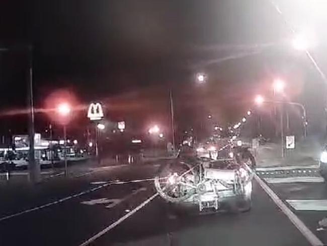 Watch: Moment wild driver ‘just misses’ head-on outside Macca’s