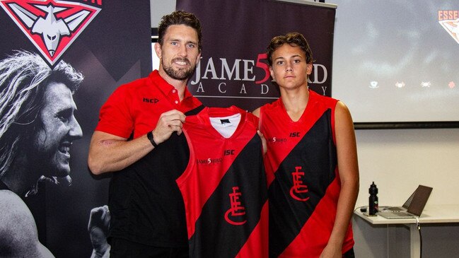 Tex Wanganeen with Essendon academy coach Heath Hocking.