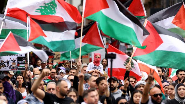 Protesters march in the Sydney CBD to call for peace and an end to the current Israeli occupation of Palestine and the ongoing war between the two nations, and the escalating assault on Lebanon. Picture: NewsWire / Damian Shaw