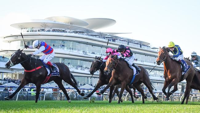 Cindy Falls (left) charges home under Dean Yendall at Flemington last month. Picture: Reg Ryan / Racing Photos