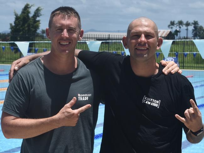 Karl Herman and best mate Richard Kellyshack at Mackay Aquatic Centre as Herman completes his 21km swim for mental health with Kellyshack as support team