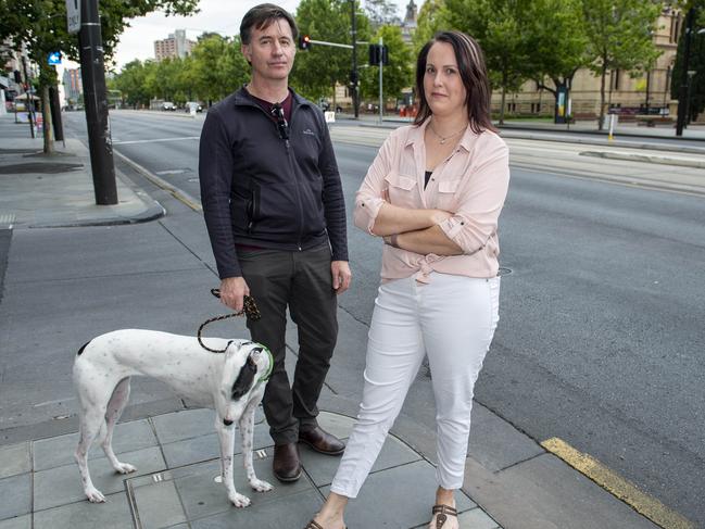 Chris Dix and Mel Haynes and their dog Spicy at the corner of Austin Street and North Terrace where they were abused by signage road workers for turning left out of Austin Street .Monday,December,13,2021.Picture Mark Brake