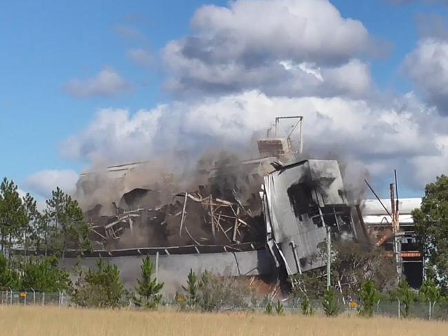 Munmorah Power Station boiler complex coming down in a controlled explosion. Picture: N &amp; T Photography.