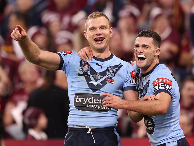 TOWNSVILLE, AUSTRALIA - JUNE 09: Tom Trbojevic of the Blues and Nathan Cleary of the Blues celebrate after scoring a try during game one of the 2021 State of Origin series between the New South Wales Blues and the Queensland Maroons at Queensland Country Bank Stadium on June 09, 2021 in Townsville, Australia. (Photo by Mark Kolbe/Getty Images)