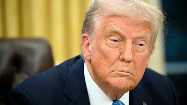 US President Donald Trump speaks to the press after signing an executive order in the Oval Office of the White House in Washington, DC on January 31, 2025. Trump is imposing steep tariffs on major US trading partners Canada, Mexico and China. Picture: Mandel Ngan / AFP