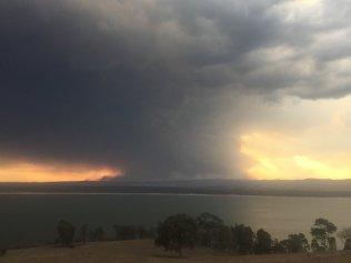 Looking towards the  Walhalla fire from Lake Glenmaggie on Sunday evening. Picture: Scott Hinton/Twitter