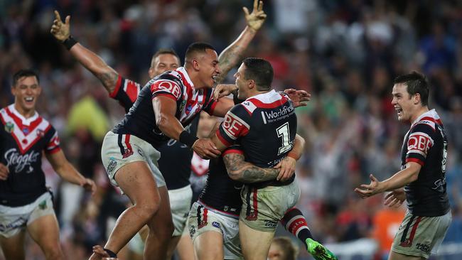 The Roosters celebrate after Pearce’s late winner. Photo: Phil Hillyard