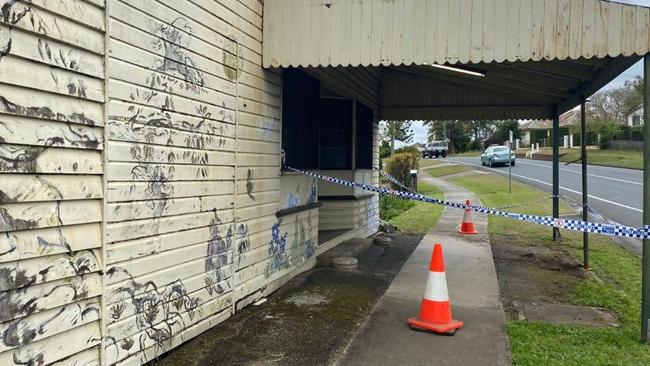 The building was partially taped off after it was damaged in the traffic crash.