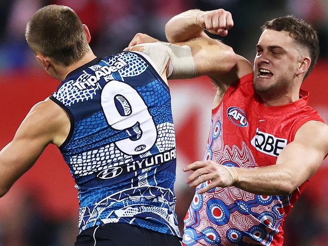 SYDNEY, AUSTRALIA - MAY 26:  Tom Papley of the Swans challenges Patrick Cripps of the Blues after kicking a goal during the round 11 AFL match between Sydney Swans and Carlton Blues at Sydney Cricket Ground, on May 26, 2023, in Sydney, Australia. (Photo by Matt King/AFL Photos/via Getty Images )