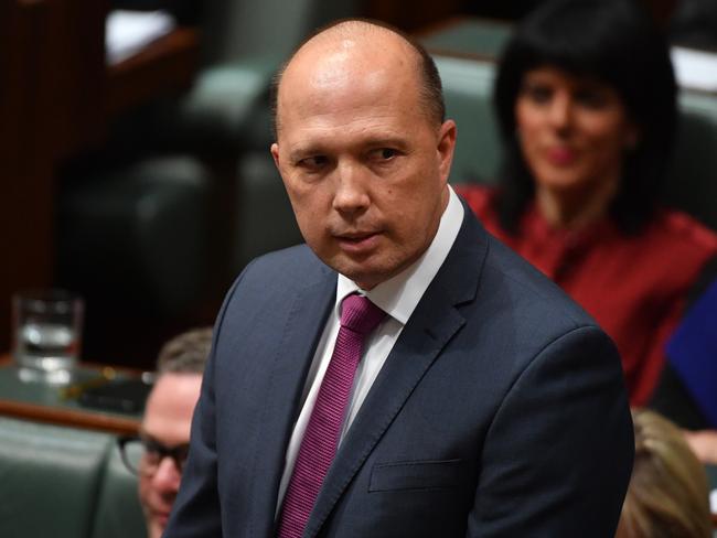 Minister for Immigration Peter Dutton has defended the policy to ban wife-bashers from becoming citizens. Picture: AAP Image/Mick Tsikas