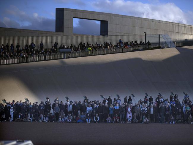 A crowd gathered at Parliament House to watch the ceremony. Picture: NCA NewsWire / Gary Ramage