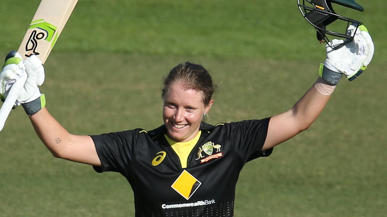 SYDNEY, AUSTRALIA - OCTOBER 02: Alyssa Healy of Australia celebrates scoring a century during game three of the Women's Twenty20 International Series between Australia and Sri Lanka at North Sydney Oval on October 02, 2019 in Sydney, Australia. (Photo by Jason McCawley/Getty Images)