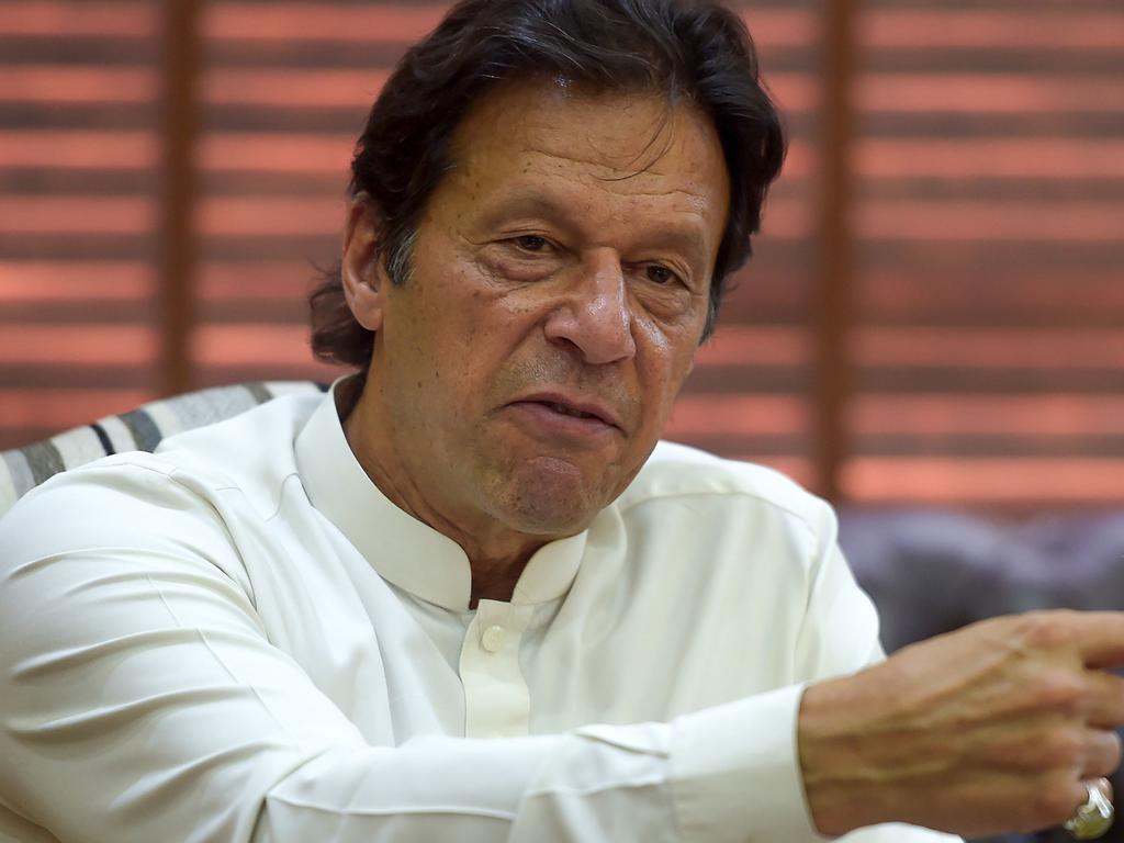 Imran Khan talks to reporters last year ahead of his election win. Picture: AFP 