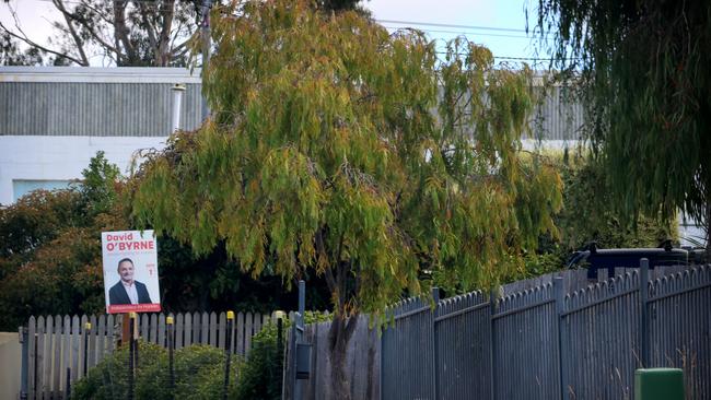 Own goal: A poster for independent David O'Byrne in the front garden of the Hobart home of Jessica Munday, secretary of Unions Tasmania. Picture: Matthew Denholm.