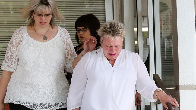 The family of Michael Welsh leaving the hearing.