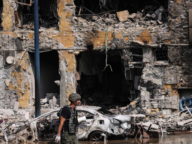 A member of the security forces walks past an Israeli police station. Picture: AFP