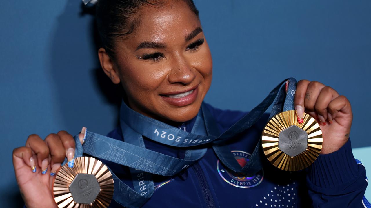 Jordan Chiles of Team United States poses with her Paris 2024 Olympic medals following the Artistic Gymnastics Women's Floor Exercise Final. (Photo by Naomi Baker/Getty Images)