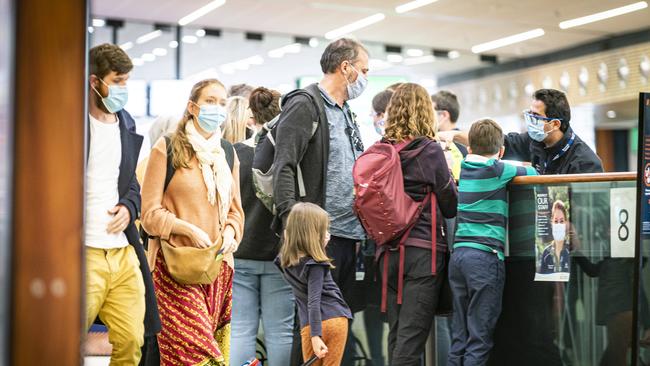 Arrivals into Hobart Airport going through Covid screening procedures with Biosecurity Tasmania. Picture: MATHEW FARRELL.