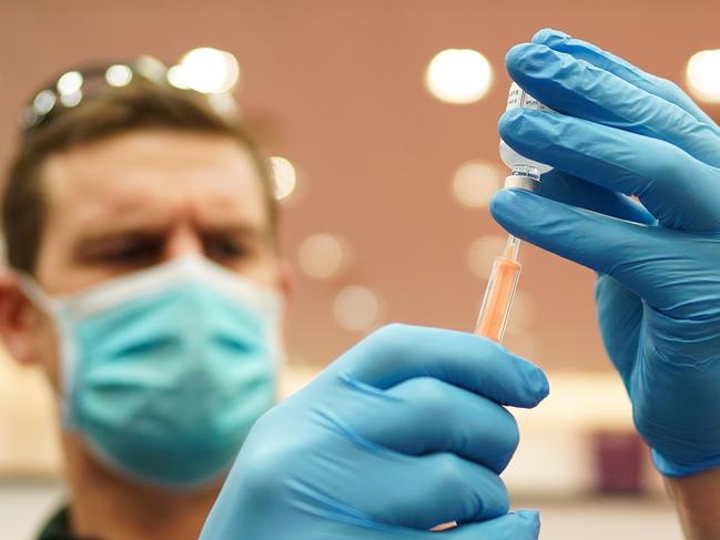 A paramedic administers the AstraZeneca vaccine at a mass vaccination hub in Newcastle upon Tyne. Picture: Ian Forsyth/Getty Images