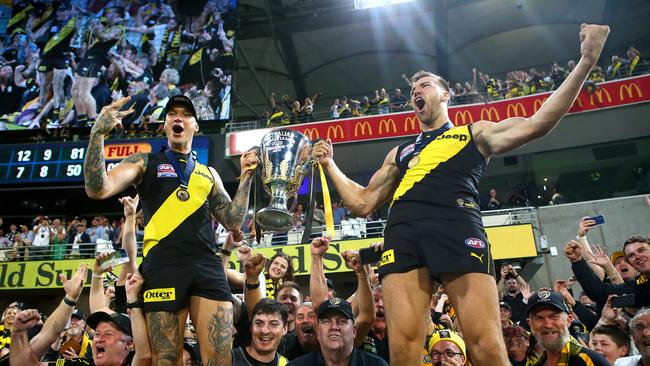 Richmond’s Dustin Martin and Noah Balta celebrate winning the 2020 AFL Grand Final. Picture: Getty Images