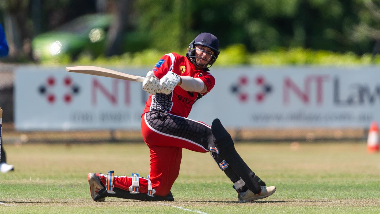 Dylan Mullen from the Southern Districts sweeps against the Waratah in the Darwin Premier Grade Cricket Competition. Picture: Che Chorley