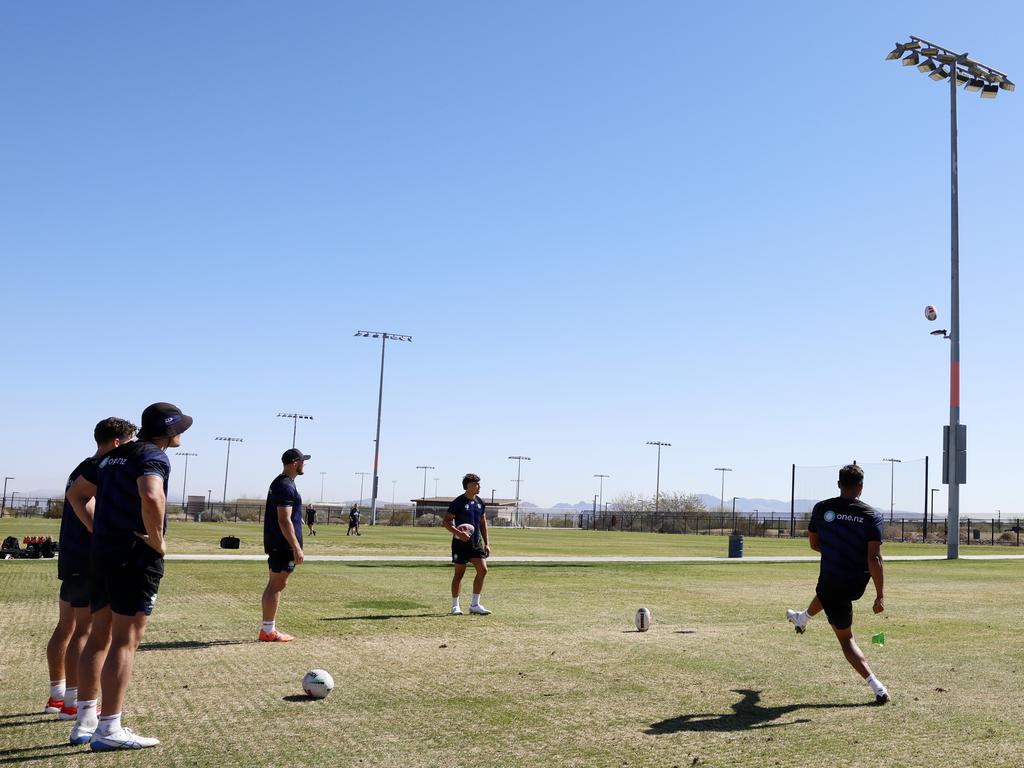 Warriors players using a light post for kicking practice as there are no goalposts at James Regional Sports Park in Las Vegas. Picture: Jonathan Ng