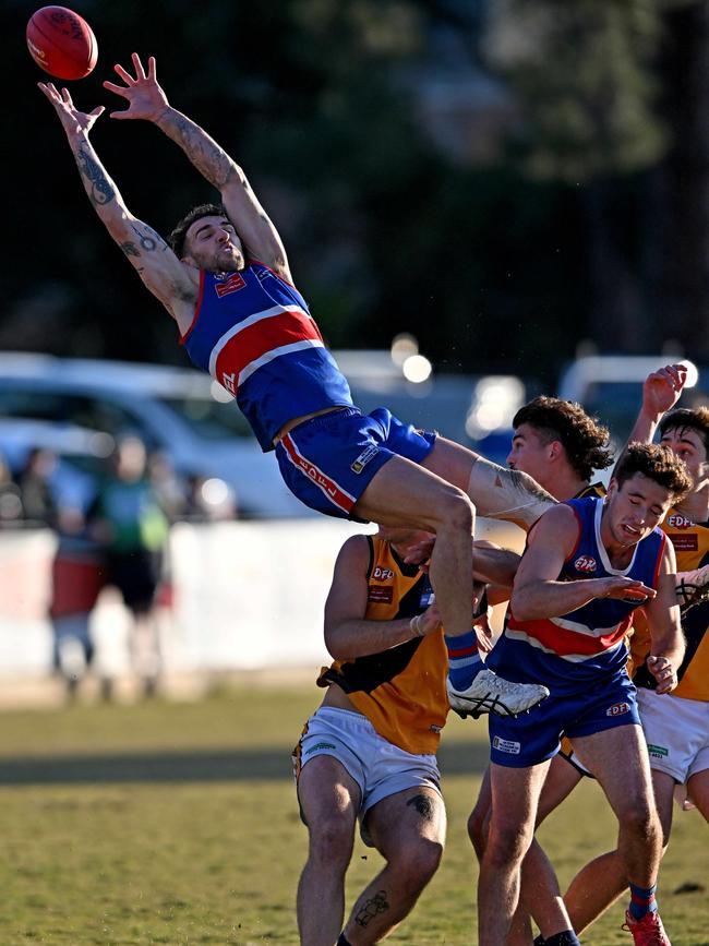 EDFL: Keilor’s Jesse Wallin attempts a screamer. Picture: Andy Brownbill