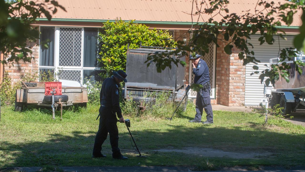 Forensic investigators at the scene of the alleged murder. Picture: Michaela Harlow