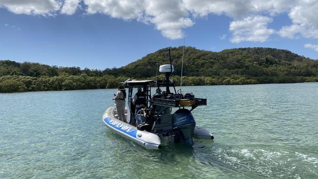 Croc experts from Townsville were sent down to help Queensland Parks and Wildlife Service continue search for a crocodile spotted at North Stradbroke Island.