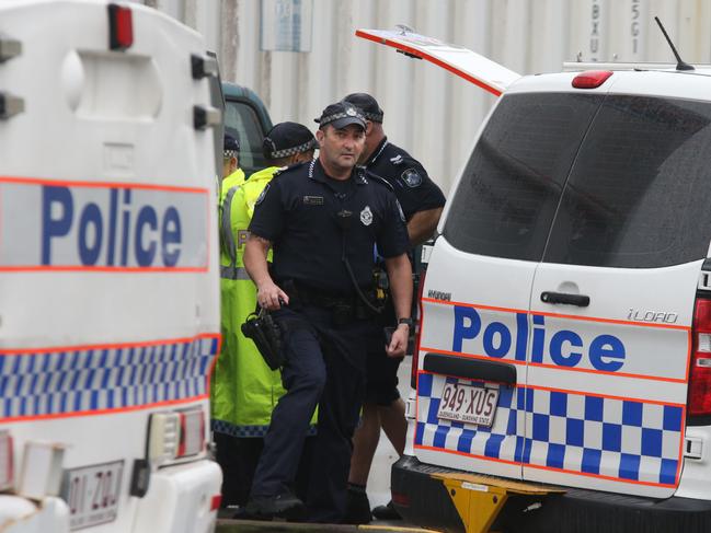 Police comb the scene outside Stocklands Shopping Centre Burleigh Heads where a body was found in a Charity Bin. Picture Glenn Hampson