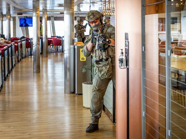 The Special Operations Group (SOG) search for perpetrators in a high-level training exercise on the Spirit of Tasmania. Picture: Jake Nowakowski