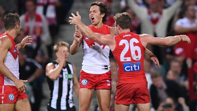 Oliver Florent celebrates a goal against Collingwood.