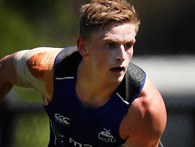 MELBOURNE, AUSTRALIA - DECEMBER 23: Jack Ziebell of the Kangaroos handpasses the ball during a North Melbourne Kangaroos AFL training session at Arden Street on December 23, 2016 in Melbourne, Australia. (Photo by Michael Willson/AFL Media/Getty Images)