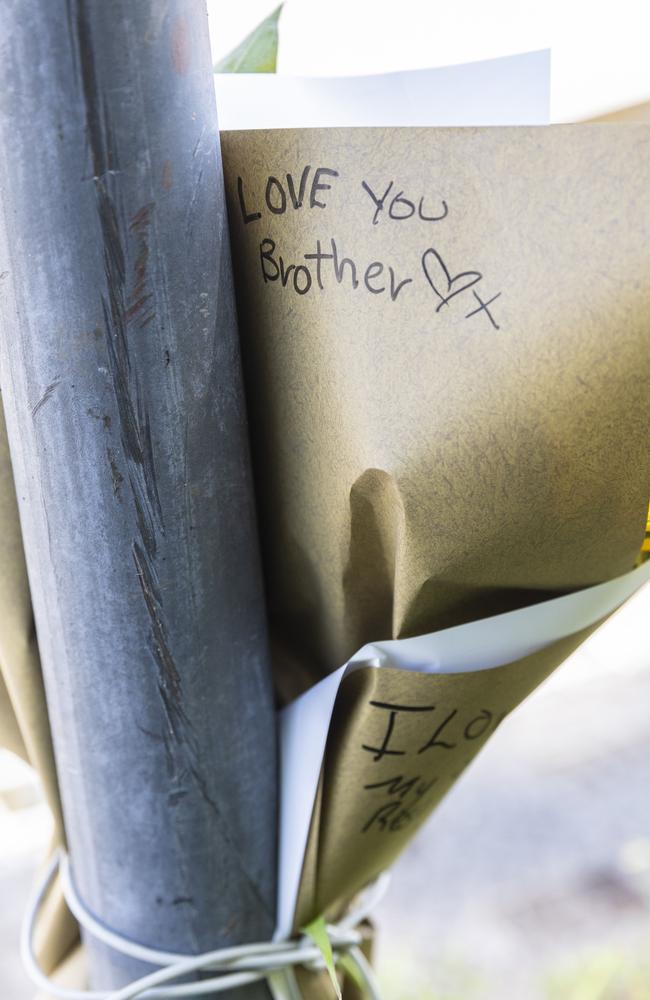 Flowers left at the scene of the stabbing murder at Goodlife Health Club.